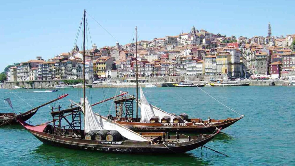 big barrels on boats in Porto City