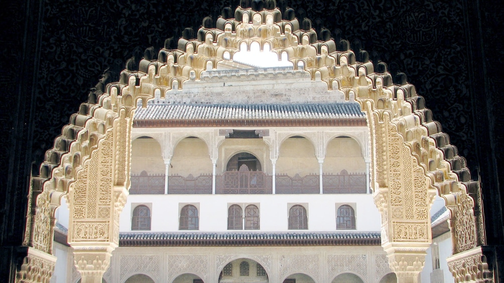 ornamented archway at the Alhambra Palace in Granada