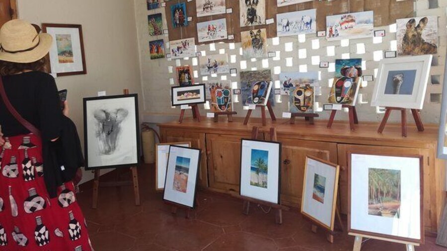 Verandah Gallery featuring beautiful paintings and drawings from local arists.