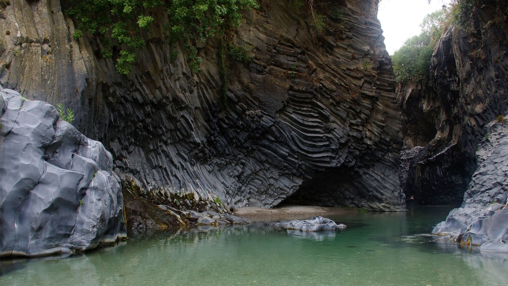 calm shallow waters at Alcantara Gorge in Sicily