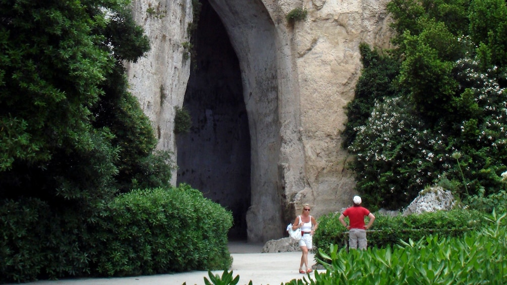 at the mouth of the Ear of Dionysius cave in Sicily