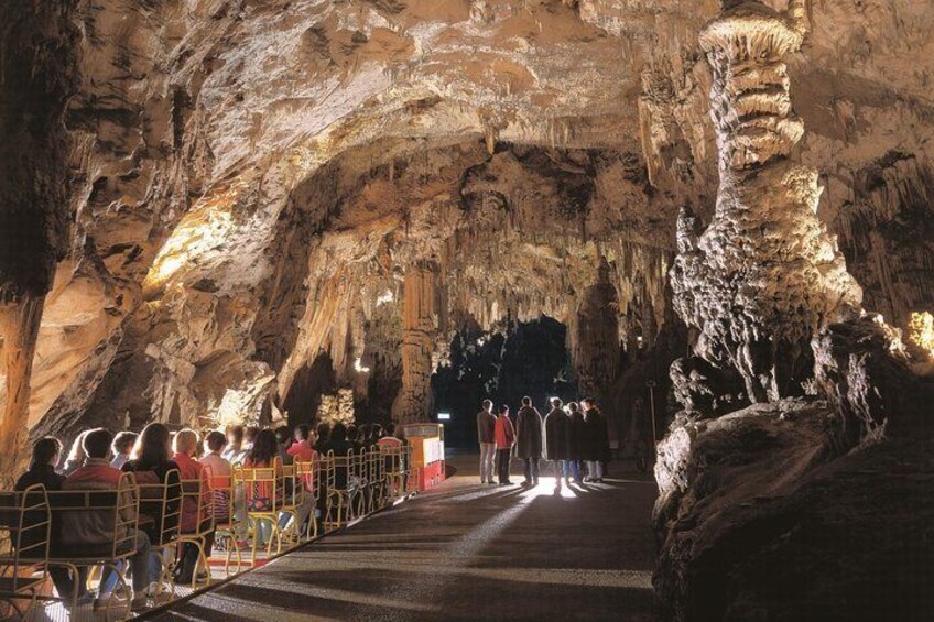 Train ride inside Postojna Cave