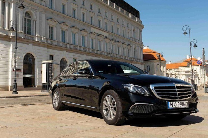 Mercedes E-class comfortable for up to 3 people.