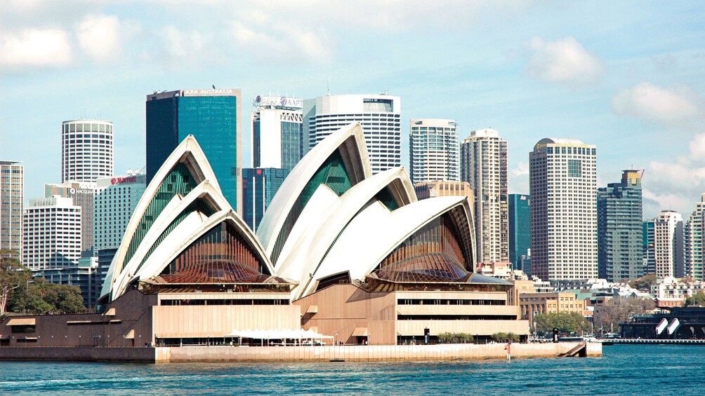 Close view of the Sydney Opera House and city buildings from the Sydney Harbour