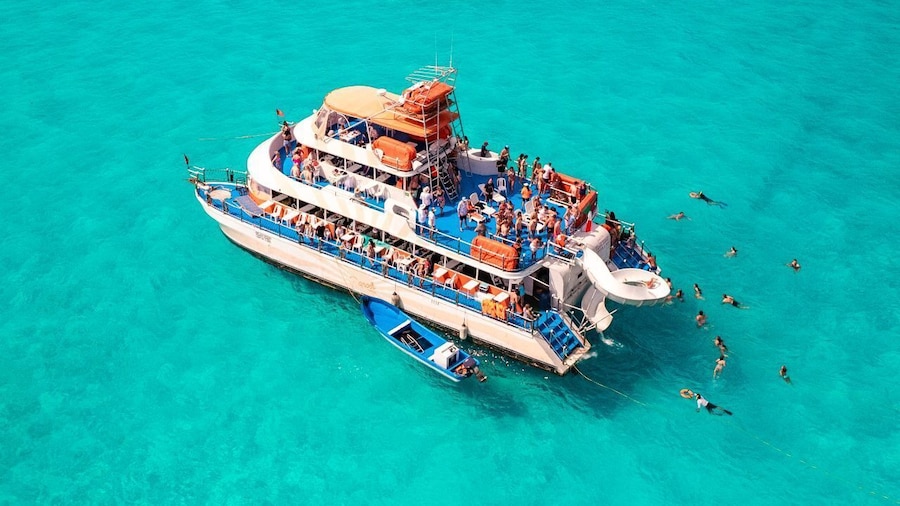 Party Boat with Open Bar, Snorkeling & Isla Mujeres Visit