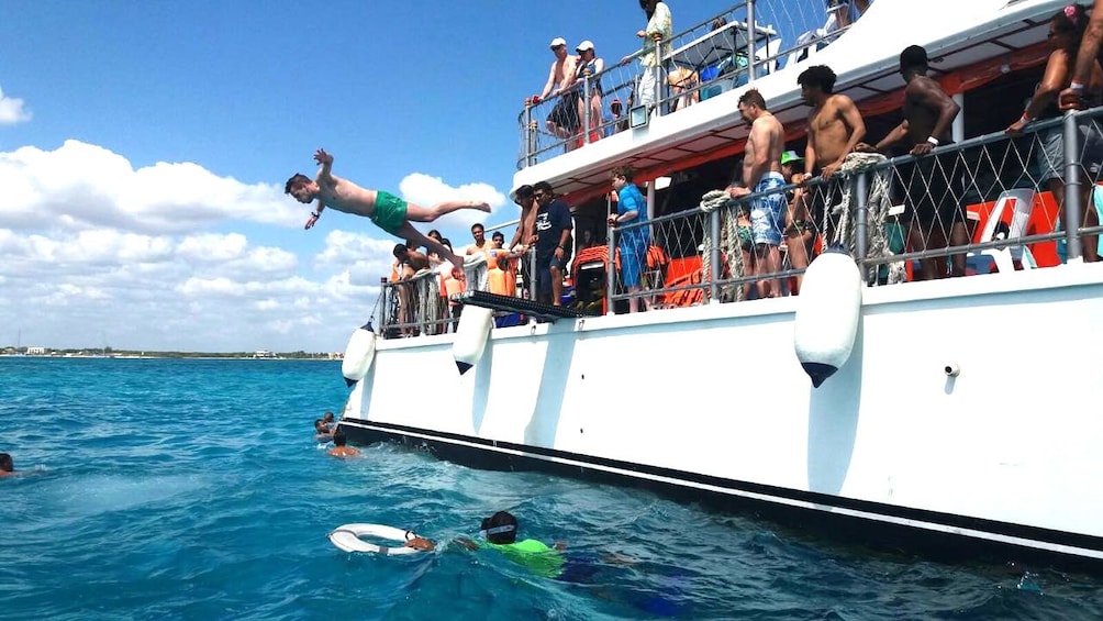 Party Boat with Snorkeling & Isla Mujeres Visit