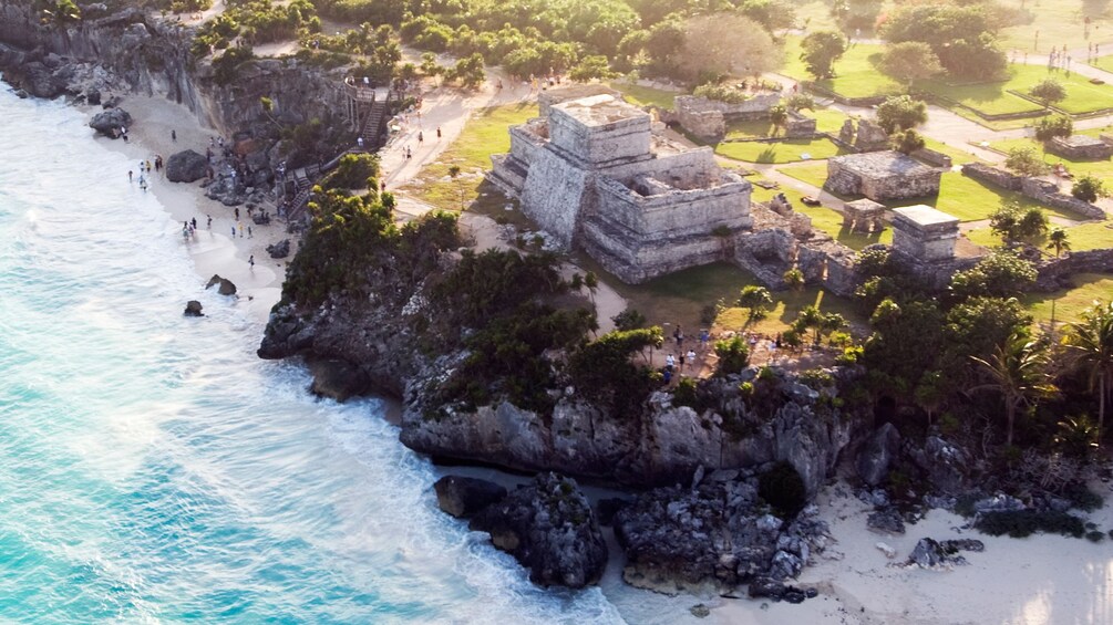 Aerial view of Tulumn overlooking the rocky cliffs and coastline of Cancun