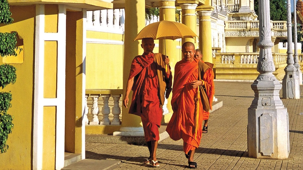 Three buddhist monks in Phnom Penh
