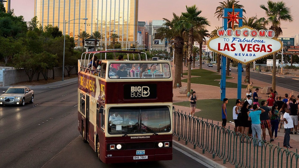 Las Vegas signature sign is a featured landmark on the double decker bus tour