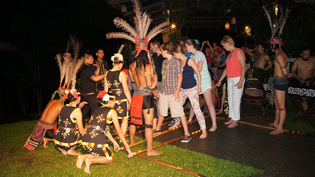 Show item 4 of 5. people dancing in kota kinabalu