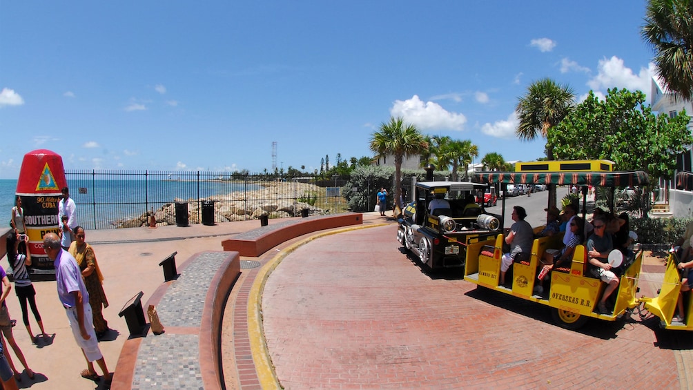 The Conch Tour Train near the ocean in Key West