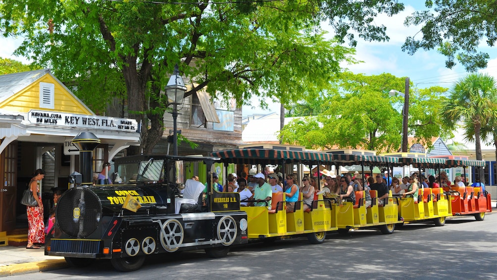 Passengers enjoying the shade on the Conch Tour Train in Key West