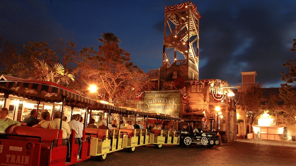 The Conch Tour Train at night in Key West