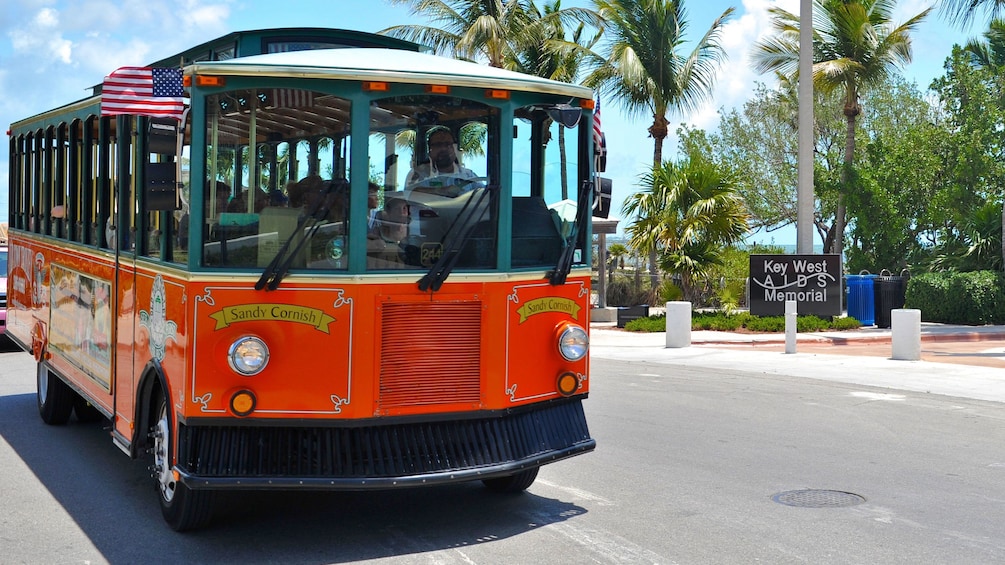 Trolley driving down the road in Key West