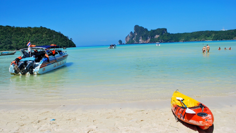 beach with kayak in thailand