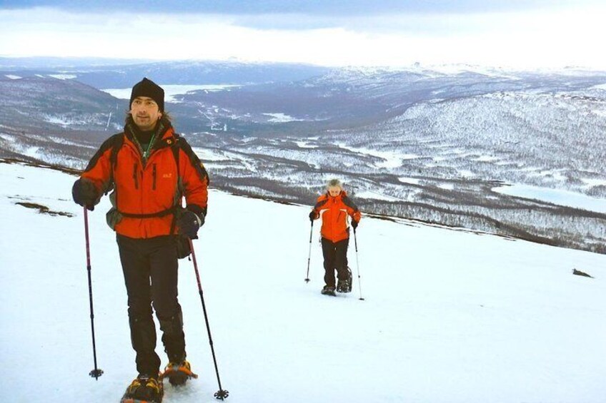 Snowshoe Hike into Lapland's White Wilderness