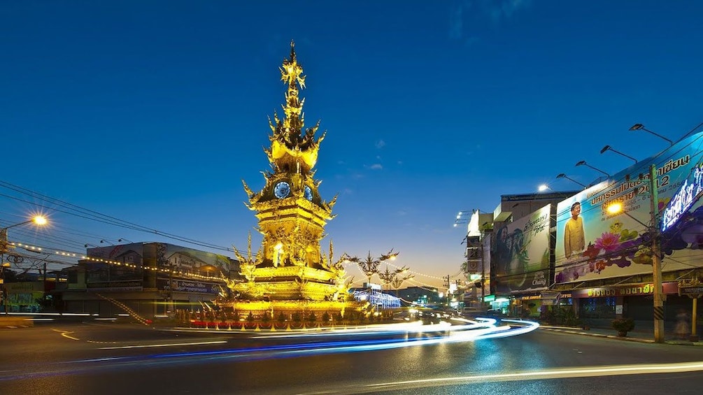 Illuminated gold statue in chiang Mai