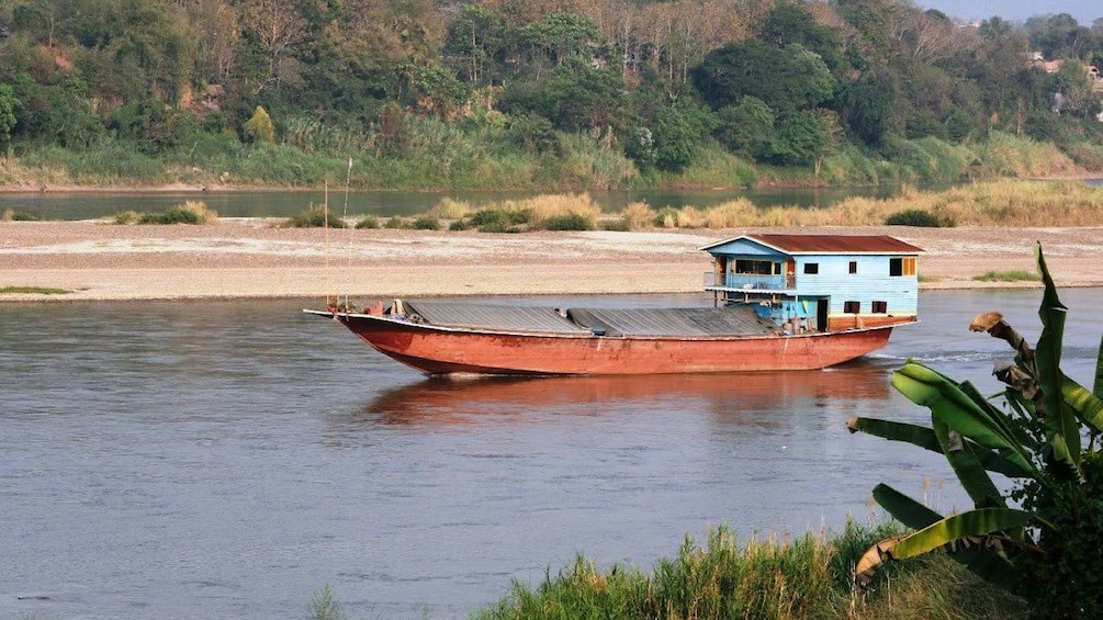 House boat on river in Chiang Mai