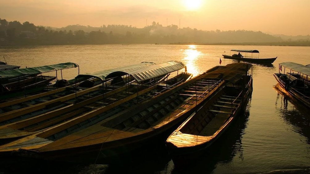 Small boats at docks in Chiang Rai