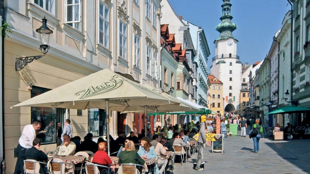 People enjoying their view of St. Martin’s Cathedral in Bratislava