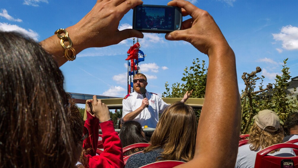 Sightseeing bus tour guide with microphone in San Francisco