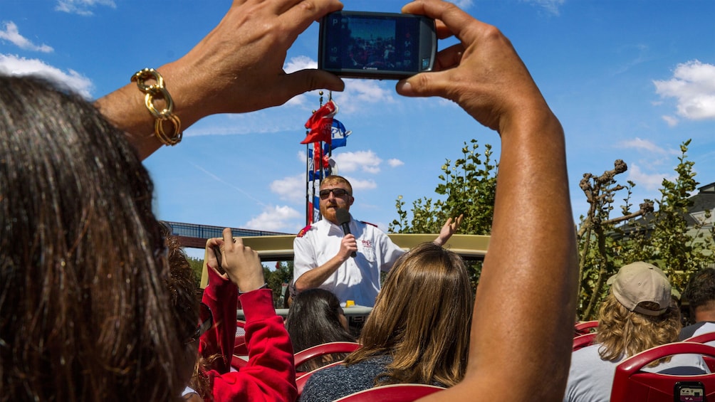 Sightseeing bus tour guide with microphone in San Francisco