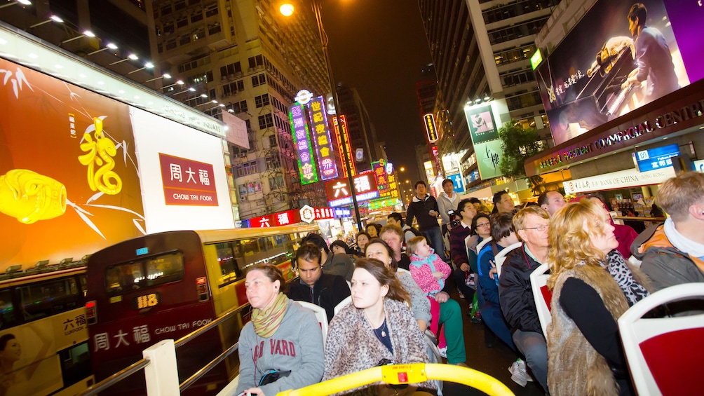 Observing the nightlife on the top deck of the bus in Hong Kong