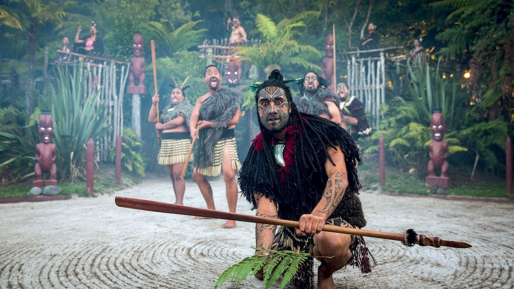 tattooed tribal men in New Zealand