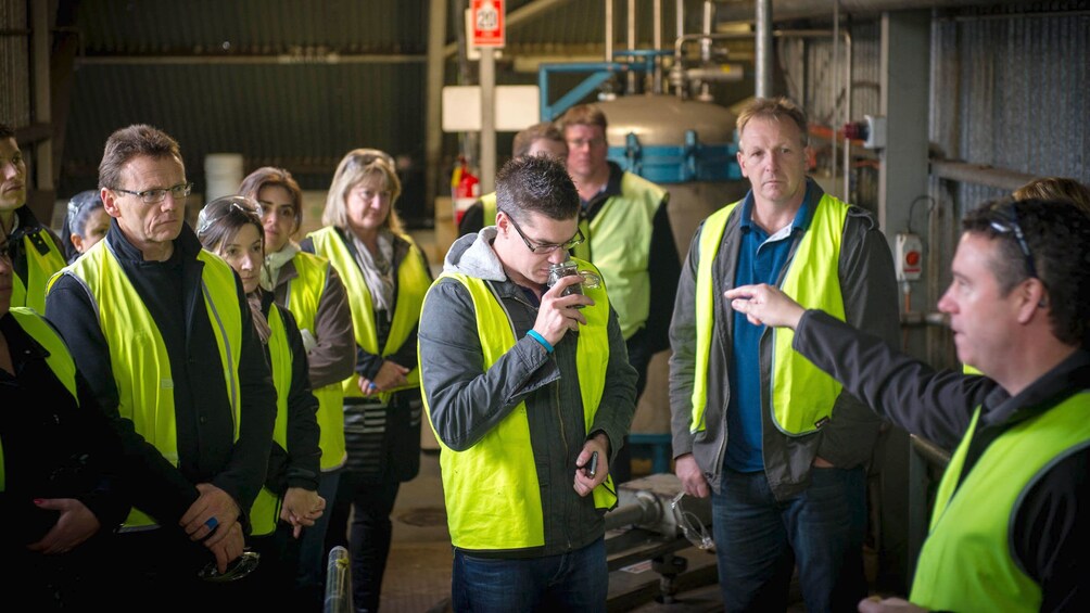 Tour group tasting beer at the Cascade Brewery Heritage Tour in Tasmania Australia 