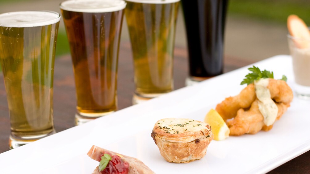 Small plates and a variety of different beer samplers at the Cascade Brewery Heritage Tour in Tasmania Australia