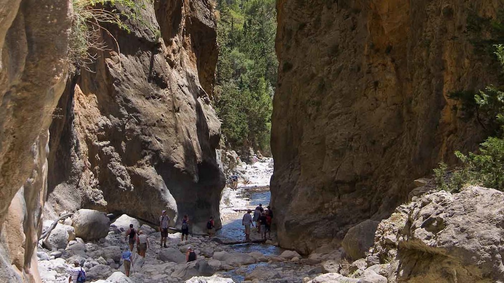 People walking down creek bed in Samariá Gorge