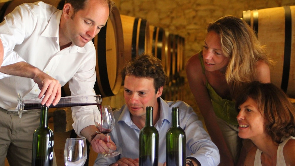 Group of people at a wine tasting in Saint Emilion