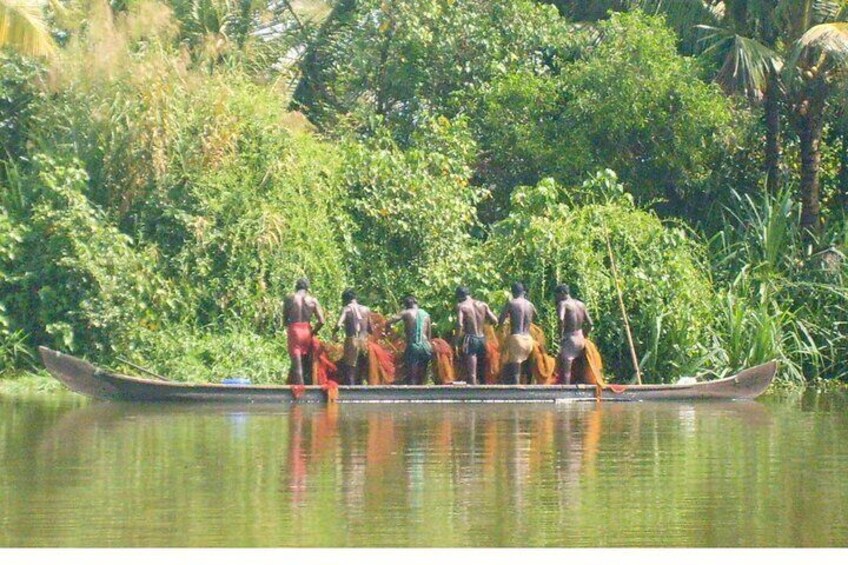 Fishermen in the backwaters.