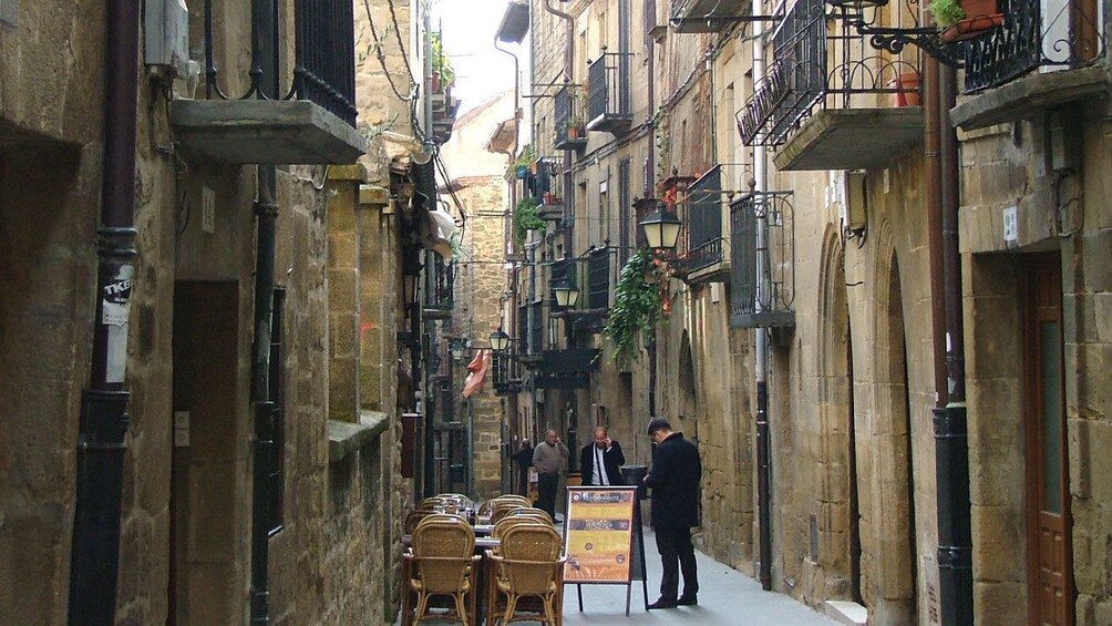 A cute cafe nestled in a street in Spain