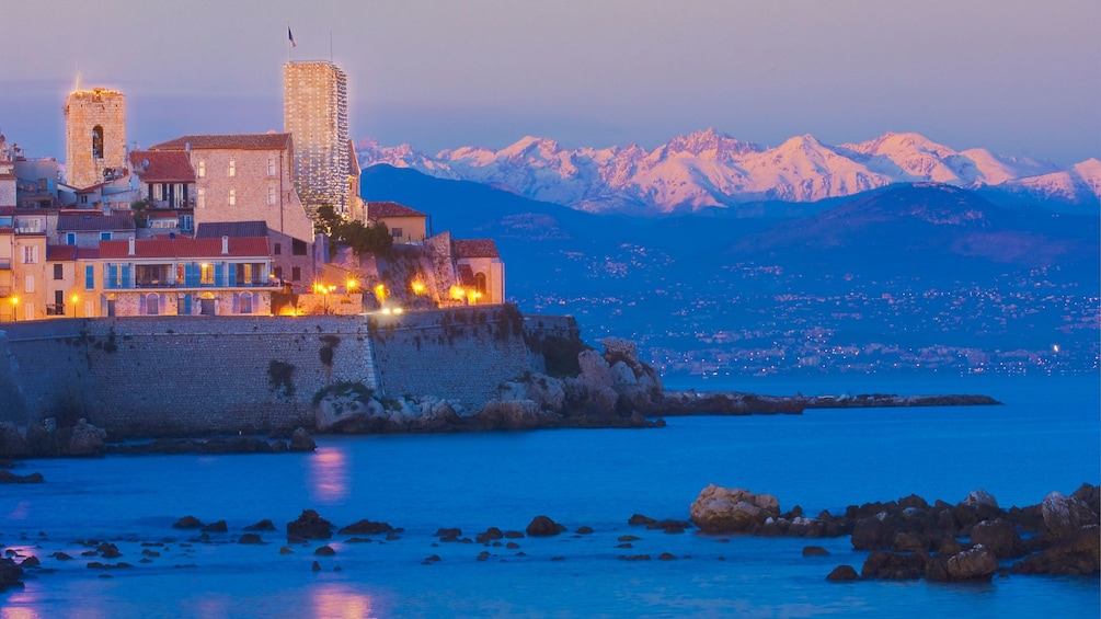 Stunning sunset view of the mountains and water in Monaco 