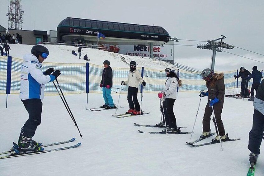 Group ski lessons on the high altitude slopes of Sinaia.