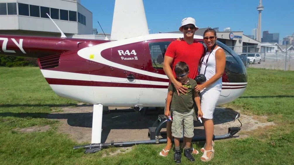 Family preparing to board a helicopter