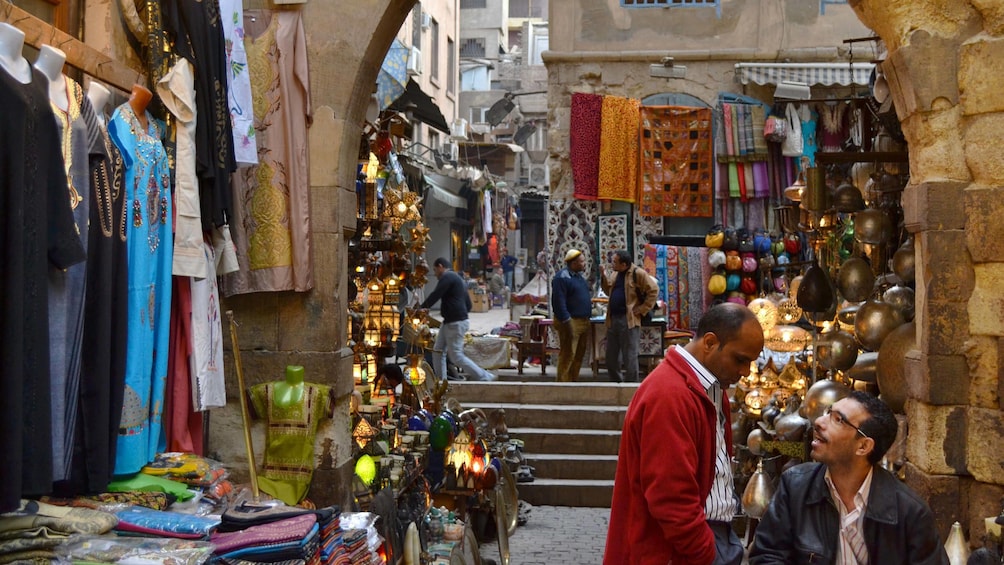 Tourists exploring the Khan el-Khalili bazaar in Cairo 