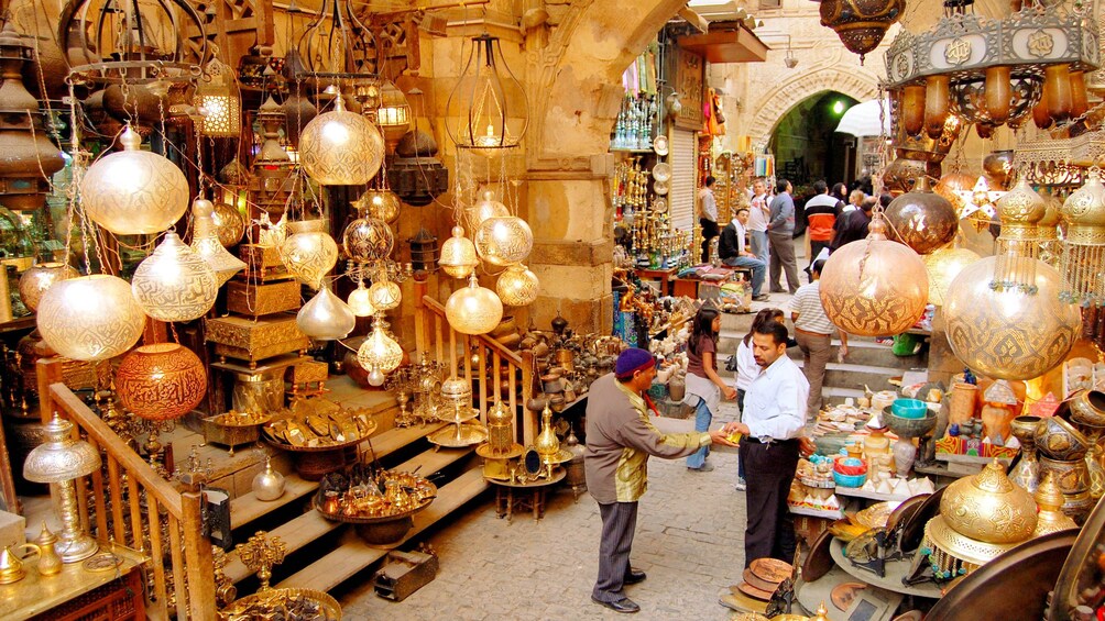 Customers buying merchandise at the Khan el-Khalili Bazaar in Cairo 