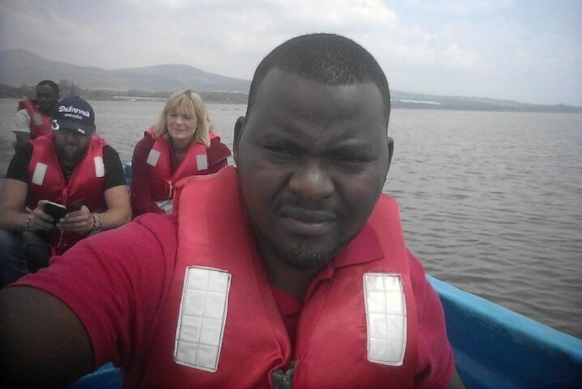 Boat riding in search of hippos and birds at lake Naivasha