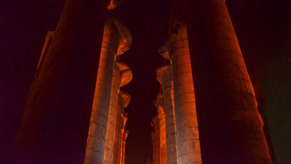 illuminated stone columns in luxor