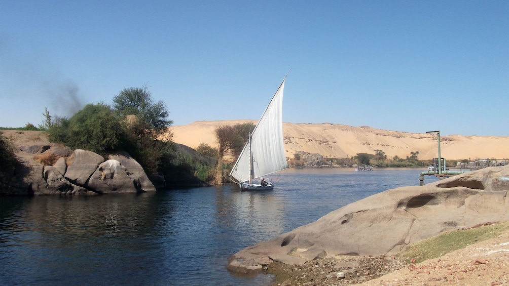 Traditional Egyptian felucca vessel sailing on the Nile River