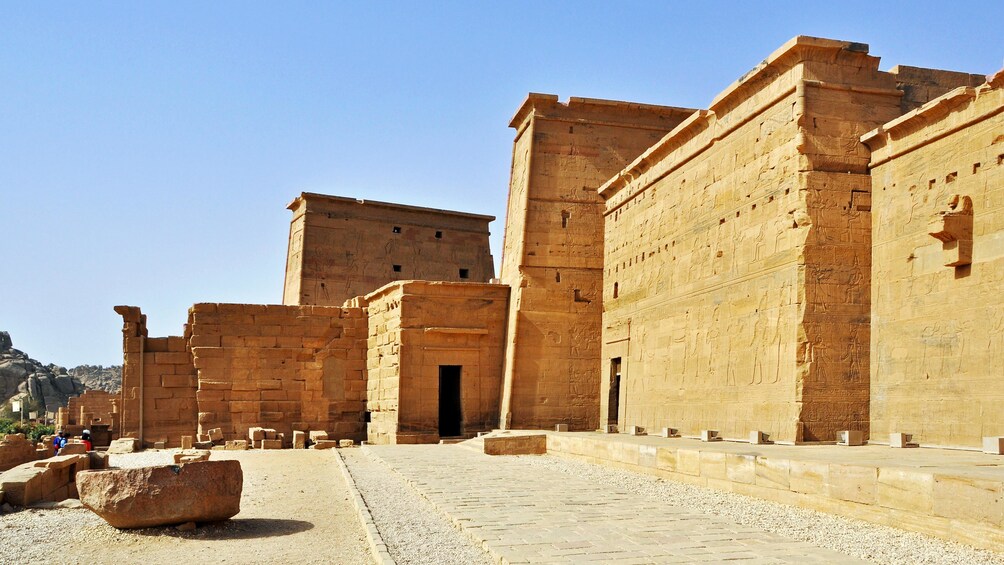 Carved stones make up the exterior walls of the Philae Temple in Aswan