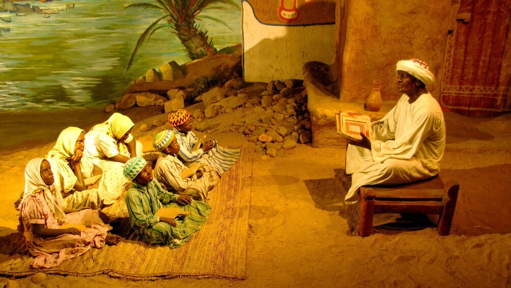 Diarama of children and teacher at the Nubian Museum in Aswan