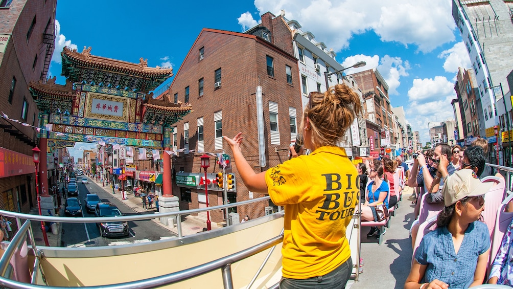 Hop-On Hop-Off bus at a Chinatown intersection in Philadelphia