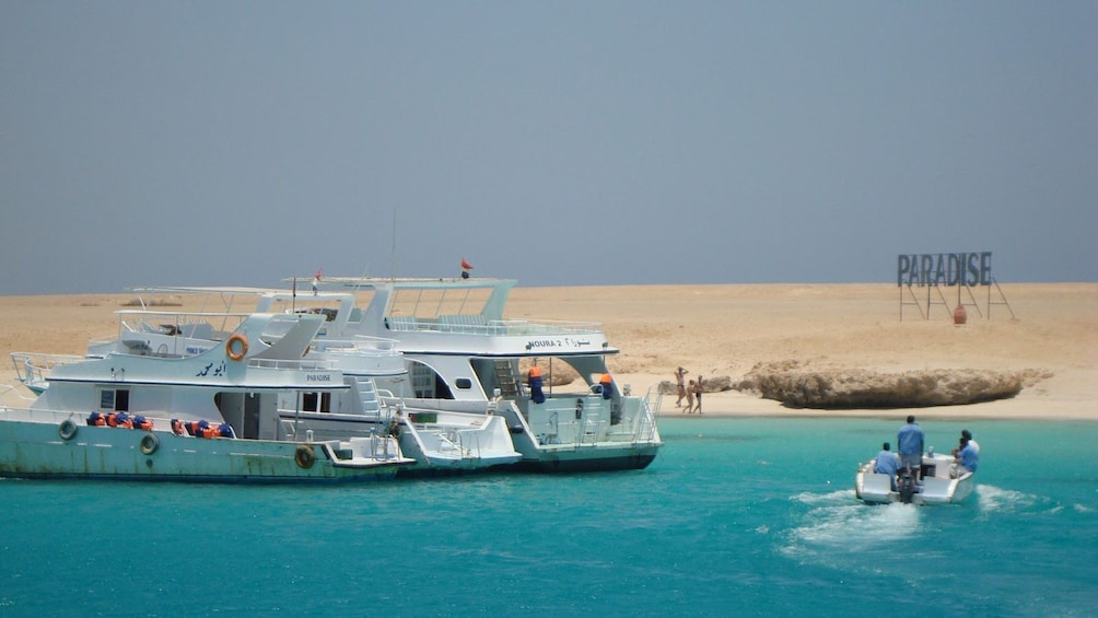 Show item 3 of 7. boats near shore in egypt