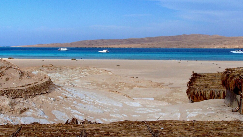 Boats anchored off the shore of Mahmaya