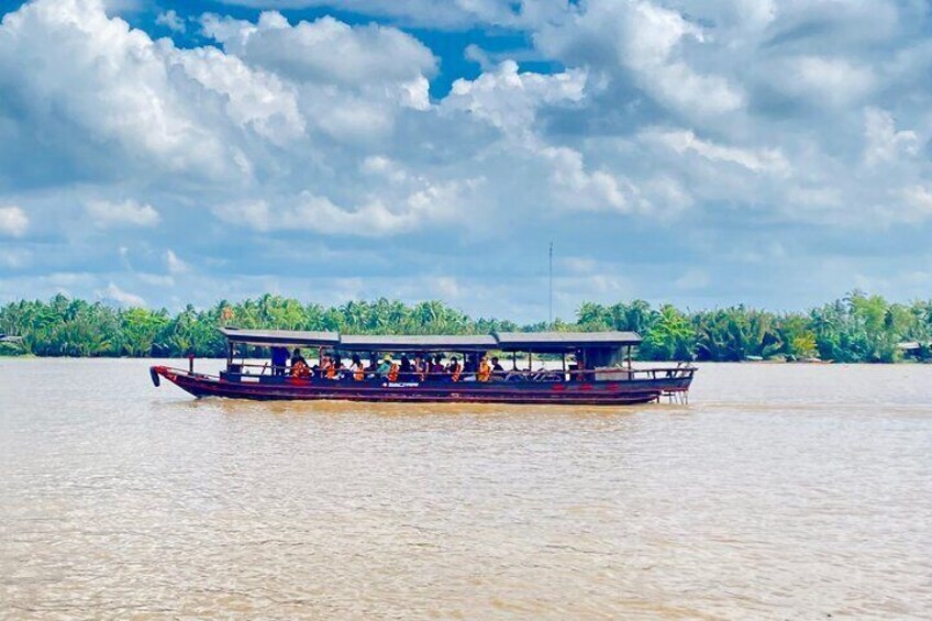 1-Day Explore Non-Touristy in Mekong Delta by Biking & Rowing from HCM City