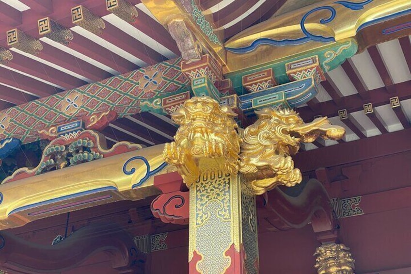 Beautiful sculptures on the main hall of Nezu shrine