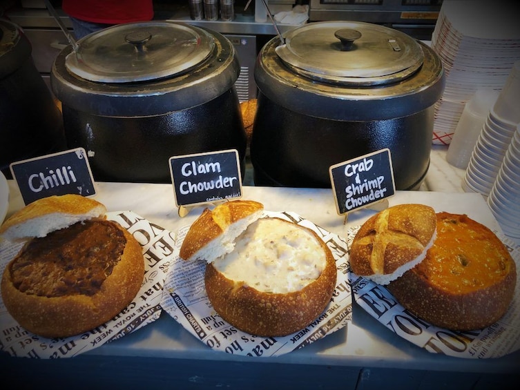 Three bread bowls filled with soup in San Francisco